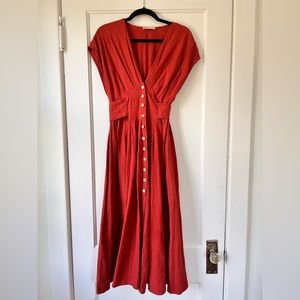 Beautiful linen orange dress with buttons and tied waistband!